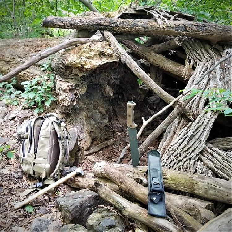 shelter building with RTAK II field knife.