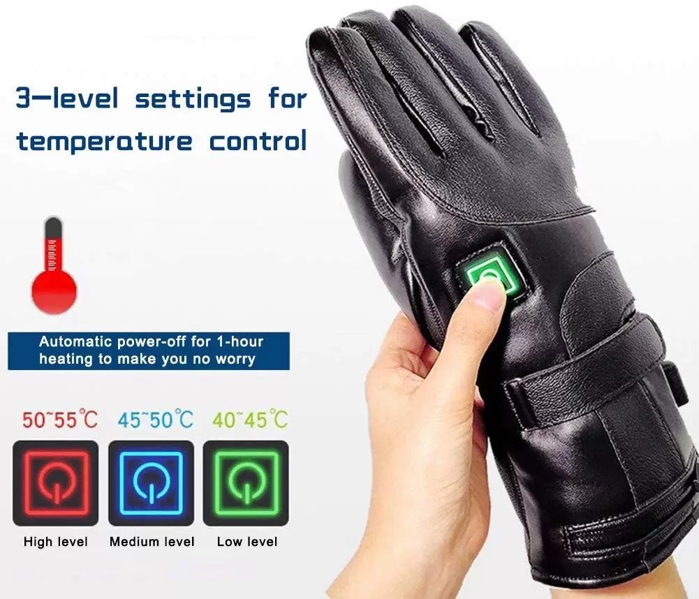 This image shows the button on the heated glove being pressed, Green for low , blue is medium, and red is high temperature